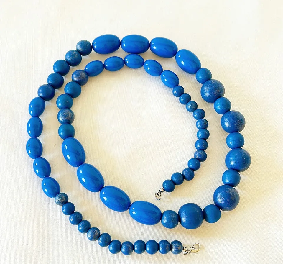 Big beautiful royal blue beaded long designer style necklace.